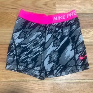 Kids Medium Nike Pros Printed with Bright Pink Band.